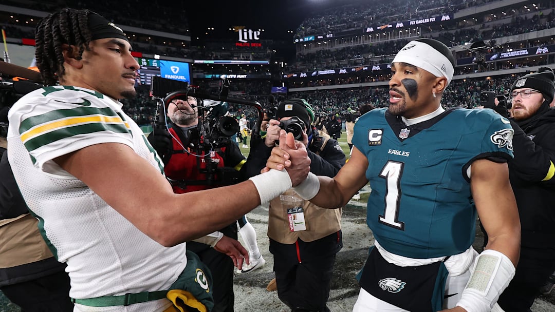 Jan 12, 2025; Philadelphia, Pennsylvania, USA; Green Bay Packers quarterback Jordan Love (10) and Philadelphia Eagles quarterback Jalen Hurts (1) shake hands after the game in an NFC wild card game at Lincoln Financial Field. Mandatory Credit: Bill Streicher-Imagn Images
