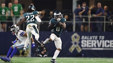 Nov 10, 2024; Arlington, Texas, USA; Philadelphia Eagles safety C.J. Gardner-Johnson (8) intercepts a pass against Dallas Cowboys wide receiver Jalen Tolbert (1) in the fourth quarter at AT&T Stadium. Mandatory Credit: Tim Heitman-Imagn Images