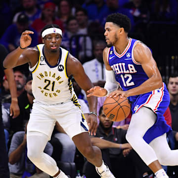 Oct 24, 2022; Philadelphia, Pennsylvania, USA; Philadelphia 76ers forward Tobias Harris (12) drives against Indiana Pacers forward Terry Taylor (21) in the second quarter at Wells Fargo Center. Mandatory Credit: Kyle Ross-Imagn Images