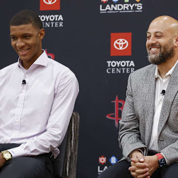 Jun 24, 2022; Houston, Texas, USA; Houston Rockets first round draft pick Jabari Smith Jr. and general manager Rafael Stone smile during a press conference at Toyota Center. Mandatory Credit: Troy Taormina-Imagn Images