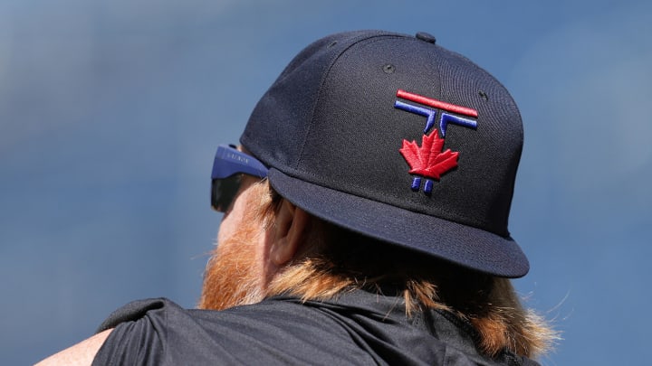 Toronto Blue Jays third base Justin Turner (2) watches batting practice wearing the new City Connect baseball cap before a game against the Pittsburgh Pirates at Rogers Centre on May 31.