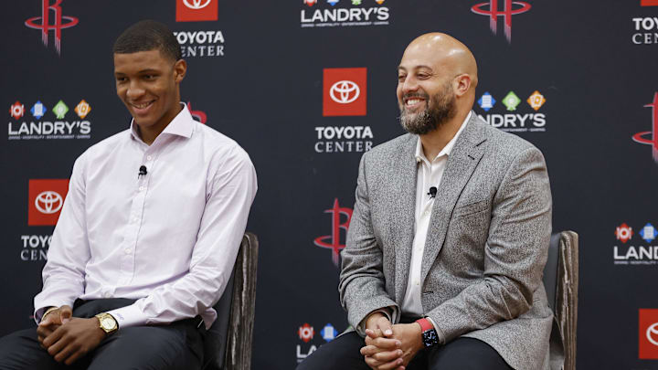 Jun 24, 2022; Houston, Texas, USA; Houston Rockets first round draft pick Jabari Smith Jr. and general manager Rafael Stone smile during a press conference at Toyota Center. Mandatory Credit: Troy Taormina-Imagn Images