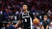 Oct 22, 2025; Dallas, Texas, USA; San Antonio Spurs guard Stephon Castle (5) in action during the game against the Dallas Mavericks at American Airlines Center.