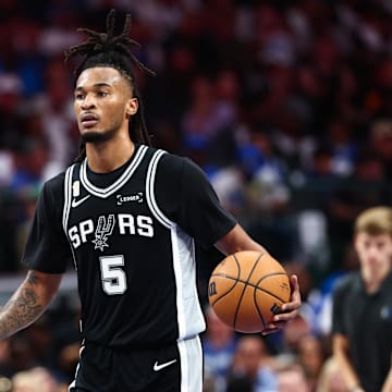 Oct 22, 2025; Dallas, Texas, USA; San Antonio Spurs guard Stephon Castle (5) in action during the game against the Dallas Mavericks at American Airlines Center.