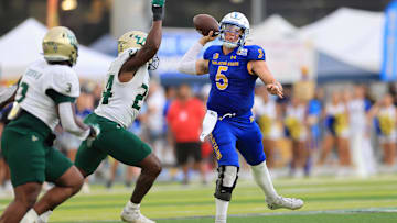 Dec 24, 2024; Honolulu, HI, USA; San Jose State Spartans quarterback Walker Eget (5) makes a pass against South Florida Bulls in the second half at Clarence T.C. Ching Athletics Complex. Mandatory Credit: Marco Garcia-Imagn Images
