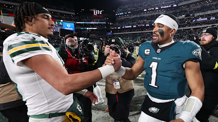 Jan 12, 2025; Philadelphia, Pennsylvania, USA; Green Bay Packers quarterback Jordan Love (10) and Philadelphia Eagles quarterback Jalen Hurts (1) shake hands after the game in an NFC wild card game at Lincoln Financial Field. Mandatory Credit: Bill Streicher-Imagn Images