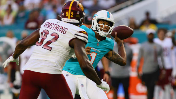 Miami Dolphins quarterback Tua Tagovailoa (1) passes the football against the Washington Commanders during the first quarter of a preseason game at Hard Rock Stadium on Saturday.