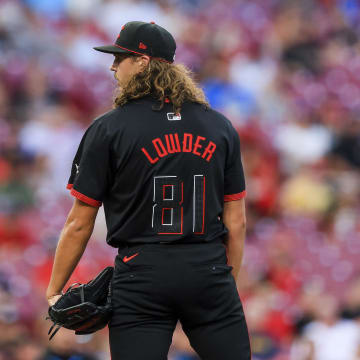 Aug 30, 2024; Cincinnati, Ohio, USA; Cincinnati Reds starting pitcher Rhett Lowder (81) prepares to pitch in the third inning against the Milwaukee Brewers at Great American Ball Park. Mandatory Credit: Katie Stratman-USA TODAY Sports