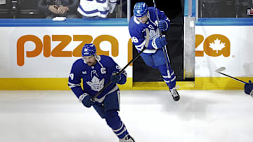 May 18, 2025; Toronto, Ontario, CAN; Toronto Maple Leafs forward Auston Matthews (34) and forward Mitch Marner (16) take to the ice for warm up before game seven of the second round of the 2025 Stanley Cup Playoffs against the Florida Panthers at Scotiabank Arena. Mandatory Credit: John E. Sokolowski-Imagn Images