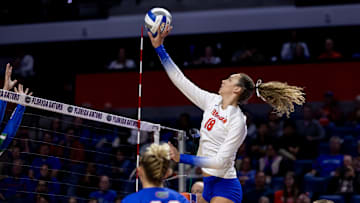 Florida Gators outside hitter Kennedy Martin (18) hits the ball during the first set against the FGCU Eagles in the first round of the NCAA Women   s Volleyball Championship at Exactech Arena at the Stephen C. O'Connell Center in Gainesville, FL on Thursday, November 30, 2023. [Matt Pendleton/Gainesville Sun]