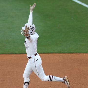 May 9, 2025; Athens, GA, USA; Texas A&M infielder KK Dement (16) reacts to her home run during a game against Texas at Jack Turner Stadium. Mandatory Credit: Mady Mertens-Imagn Images