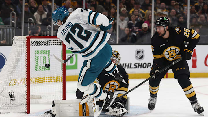 Mar 12, 2026; Boston, Massachusetts, USA; San Jose Sharks left wing William Eklund (72) bats the puck out of the air for a goal past Boston Bruins goaltender Jeremy Swayman (1) during the third period at TD Garden. Mandatory Credit: Winslow Townson-Imagn Images