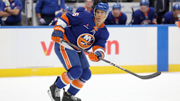Nov 5, 2024; Elmont, New York, USA; New York Islanders defenseman Isaiah George (36) skates against the Pittsburgh Penguins during the second period at UBS Arena. Mandatory Credit: Brad Penner-Imagn Images