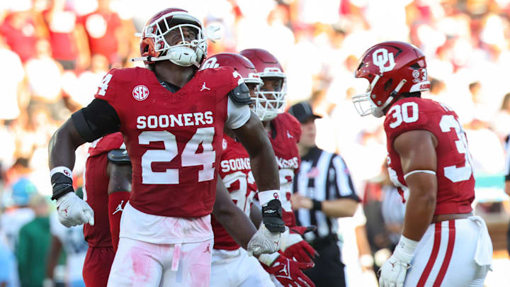 Sep 14, 2024; Norman, Oklahoma, USA;  Oklahoma Sooners linebacker Samuel Omosigho (24) reacts during the second half against the Tulane Green Wave at Gaylord Family-Oklahoma Memorial Stadium. 