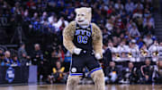 Mar 27, 2025; Newark, NJ, USA; Brigham Young Cougars mascot Cosmo the Cougar performs during an East Regional semifinal of the 2025 NCAA tournament against the Alabama Crimson Tide at Prudential Center. 
