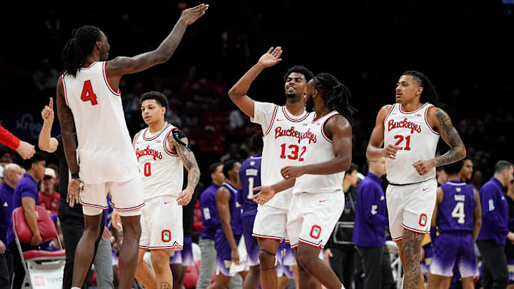 Ohio State Buckeyes forward Aaron Bradshaw (4) celebrates a block by forward Sean Stewart (13) during the second half of the NCAA men's basketball game against the Washington Huskies at Value City Arena in Columbus on Feb. 12, 2025. Ohio State won 93-69.