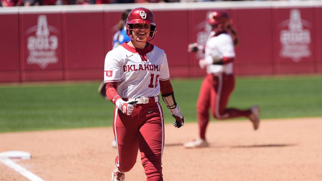 Oklahoma outfielder Abby Dayton was all smiles after the Sooners hit a home run against Kentucky.