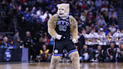 Mar 27, 2025; Newark, NJ, USA; Brigham Young Cougars mascot Cosmo the Cougar performs during an East Regional semifinal of the 2025 NCAA tournament against the Alabama Crimson Tide at Prudential Center. Mandatory Credit: Vincent Carchietta-Imagn Images