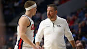 Dec 7, 2024; Oxford, Mississippi, USA; Mississippi Rebels head coach Chris Beard talks with guard Sean Pedulla (3) during the second half against the Lindenwood Lions at The Sandy and John Black Pavilion at Ole Miss. Mandatory Credit: Petre Thomas-Imagn Images