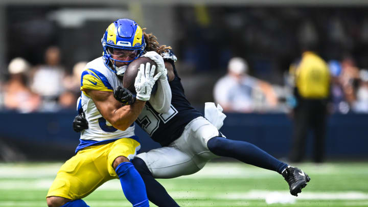 Aug 11, 2024; Inglewood, California, USA; Dallas Cowboys cornerback Josh Butler (31) tackles Los Angeles Rams wide receiver Jordan Whittington (88) during the third quarter at SoFi Stadium. Mandatory Credit: Jonathan Hui-USA TODAY Sports