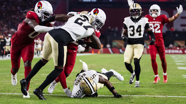 Shemar Jean-Charles (27) makes an open field tackle against the Arizona Cardinals 