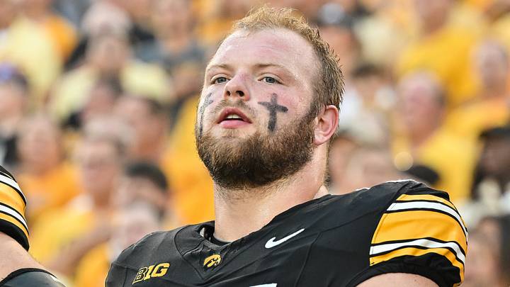 Sep 13, 2025; Iowa City, Iowa, USA; Iowa Hawkeyes offensive lineman Logan Jones (65) looks on before the game against the Massachusetts Minutemen at Kinnick Stadium. Mandatory Credit: Jeffrey Becker-Imagn Images