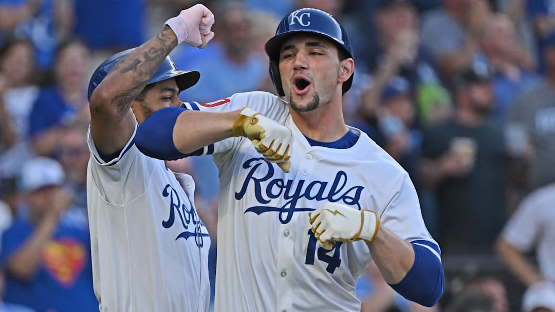 Jul 9, 2025; Kansas City, Missouri, USA; Kansas City Royals right fielder Jac Caglianone (14) celebrates with teammate third baseman Maikel Garcia (11) after hitting a two-run home run in the fourth inning against the Pittsburgh Pirates at Kauffman Stadium. Mandatory Credit: Peter Aiken-Imagn Images Jul 9, 2025; Kansas City, Missouri, USA; Kansas City Royals right fielder Jac Caglianone (14) celebrates with teammate third baseman Maikel Garcia (11) after hitting a two-run home run in the fourth inning against the Pittsburgh Pirates at Kauffman Stadium. Mandatory Credit: Peter Aiken-Imagn Images