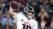 Atlanta Falcons quarterback Kirk Cousins throws a pass.