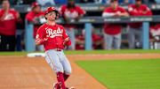 Cincinnati Reds second baseman Matt McLain (9) stands up into a double in the third inning of the MLB National League Wild Card Game 1 between the Los Angeles Dodgers and the Cincinnati Reds at Dodger Stadium in Los Angeles on Tuesday, Sept. 30, 2025. The Dodgers won game 1 of the series, 10-5.