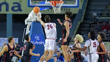 Weatherford’s Tate Sage (24) lays up the ball during the semifinals of the OSSAA 4A high school boys basketball tournament between Weatherford and North Rock Creek at State Fair Arena in Oklahoma City, on Friday, March 14, 2025.
