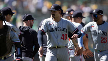 Jun 23, 2024; Oakland, California, USA; Minnesota Twins starting pitcher Pablo Lopez (49) celebrates a 3-0 victory over the Oakland Athletics at Oakland-Alameda County Coliseum. Mandatory Credit: D. Ross Cameron-USA TODAY Sports