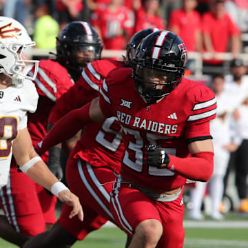 Sep 21, 2024; Lubbock, Texas, USA;  Texas Tech Red Raiders defensive back Miquel Dingle Jr. (35) pressures Arizona State Sun Devils quarterback Sam Leavitt (10) in the second half at Jones AT&T Stadium and Cody Campbell Field. Mandatory Credit: Michael C. Johnson-Imagn Images