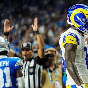 Los Angeles Rams wide receiver Cooper Kupp (10) celebrates a touchdown against with wide receiver Tyler Johnson (18) during the second half at Ford Field in Detroit on Sunday, September 8, 2024.