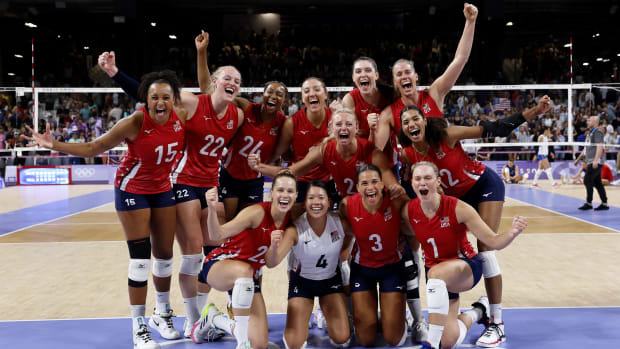 The United States celebrates after their win against Serbia in a pool A match during the Paris 2024 Olympic Summer Games at S