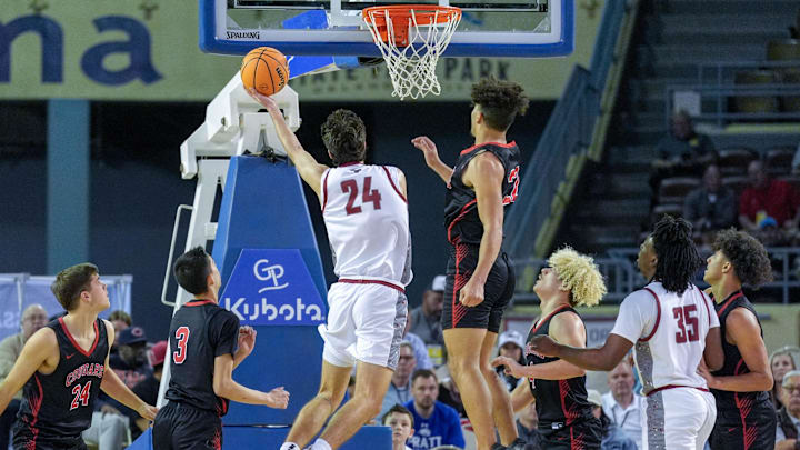 Weatherford’s Tate Sage (24) lays up the ball during the semifinals of the OSSAA 4A high school boys basketball tournament between Weatherford and North Rock Creek at State Fair Arena in Oklahoma City, on Friday, March 14, 2025.