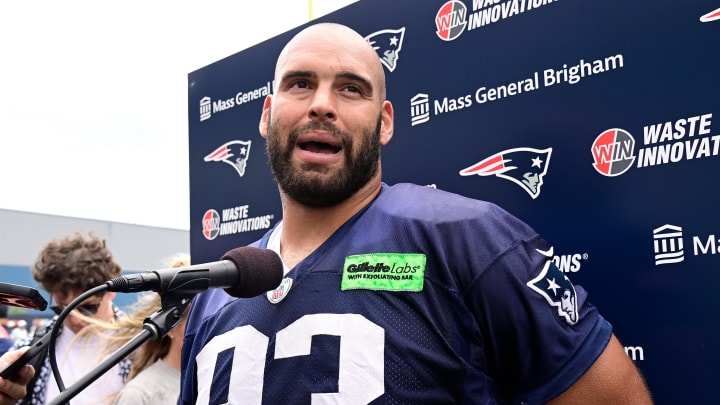 Jul 27, 2023; Foxborough, MA, USA; New England Patriots defensive end Lawrence Guy (93) speaks to the media after training camp at Gillette Stadium.  