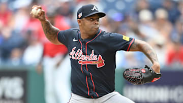 Aug 17, 2025; Cleveland, Ohio, USA; Atlanta Braves relief pitcher Raisel Iglesias (26) throws a pitch during the ninth inning against the Cleveland Guardians at Progressive Field. Mandatory Credit: Ken Blaze-Imagn Images