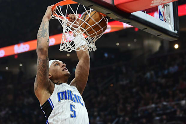 Orlando Magic forward Paolo Banchero dunks the ball during an NBA playoffgame versus the Cleveland Cavaliers.