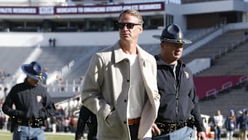 Nov 28, 2025; Starkville, Mississippi, USA; Mississippi Rebels head coach Lane Kiffin walks on field before the game against the Mississippi State Bulldogs at Davis Wade Stadium at Scott Field. Mandatory Credit: Petre Thomas-Imagn Images