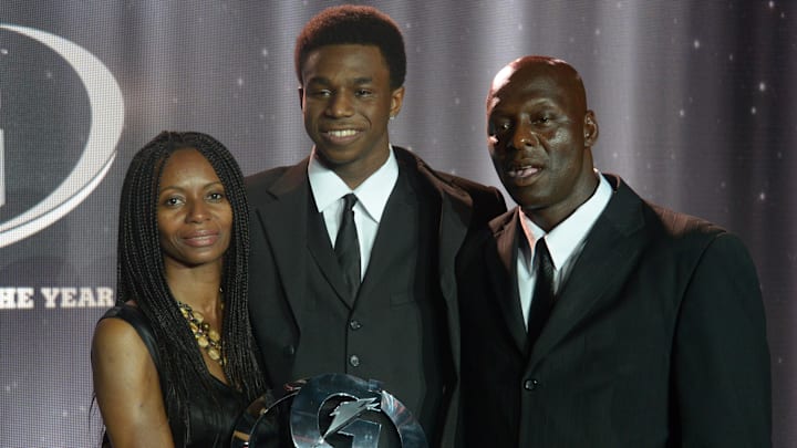 Andrew Wiggins with his mother Marita Payne and father Mitchell Wigginis after receiving the 2013 Gatorade National Boys Athlete of the Year Award.