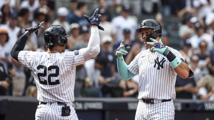 Aug 25, 2024; Bronx, New York, USA;  New York Yankees center fielder Aaron Judge (99) celebrates with right fielder Juan Soto (22) after hitting a solo home run in the seventh inning against the Colorado Rockies at Yankee Stadium.