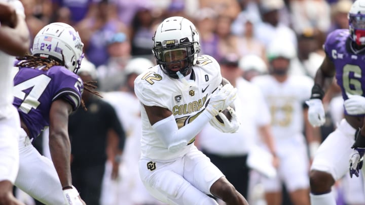Sep 2, 2023; Fort Worth, Texas, USA; Colorado Buffaloes wide receiver Travis Hunter (12) runs after catching a ball in the first half against the TCU Horned Frogs at Amon G. Carter Stadium. Mandatory Credit: Tim Heitman-USA TODAY Sports