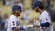 Jun 11, 2021; Los Angeles, California, USA; Los Angeles Dodgers third baseman Justin Turner (left) celebrates with center fielder Cody Bellinger (35) after a solo home run during the first inning against the Texas Rangers at Dodger Stadium. Mandatory Credit: Kelvin Kuo-USA TODAY Sports