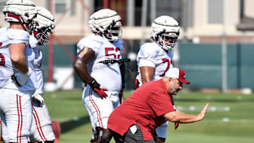 The Crimson Tide players and coaches continue working toward the season opener in practice Tuesday, Aug. 13, 2024. Alabama offensive line coach Chris Kapilovic directs his linemen.