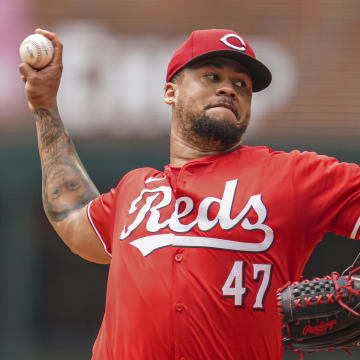 Jul 24, 2024; Cumberland, Georgia, USA; Cincinnati Reds starting pitcher Frankie Montas (47) pitches against the Atlanta Braves during the first inning at Truist Park. Mandatory Credit: Dale Zanine-USA TODAY Sports