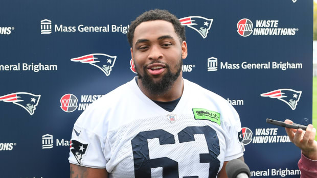 New England Patriots guard Layden Robinson (63) speaks to the media after practice at the New England Patriots rookie camp at