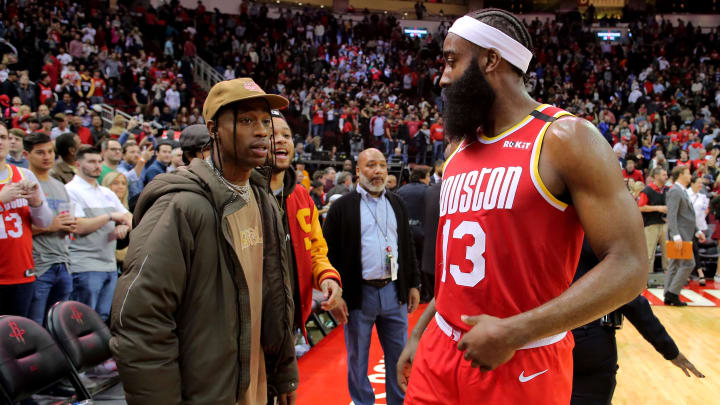 Jan 3, 2020; Houston, Texas, USA; Houston Rockets guard James Harden (13) talks with Houston native and recording artist Travis Scott following a game against the  Philadelphia 76ers at Toyota Center. Mandatory Credit: Erik Williams-USA TODAY Sports