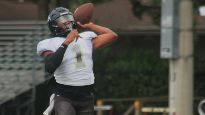 Zarephath quarterback Jordan Durham (1) throws during warm-ups for the restart of a suspended high school football game at Episcopal on September 3, 2024. [Clayton Freeman/Florida Times-Union]