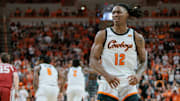 Feb 24, 2024; Stillwater, Oklahoma, USA; Oklahoma State Cowboys guard Javon Small (12) reacts after a play during the first half against the Oklahoma Sooners at Gallagher-Iba Arena. Mandatory Credit: William Purnell-Imagn Images