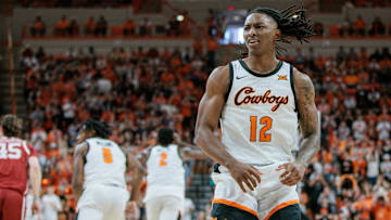 Feb 24, 2024; Stillwater, Oklahoma, USA; Oklahoma State Cowboys guard Javon Small (12) reacts after a play during the first half against the Oklahoma Sooners at Gallagher-Iba Arena. Mandatory Credit: William Purnell-Imagn Images